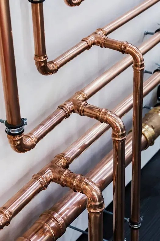Precision whole-home copper repiping and manifold valve array